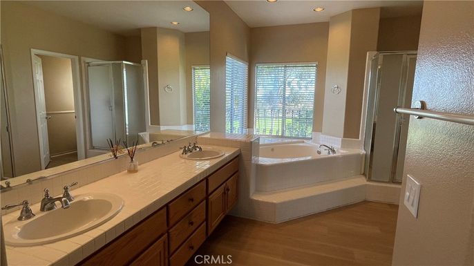 Bathroom, Dual Sink Vanities, Interior, Recessed Lighting, Tile Countertops, Wood Texture Flooring