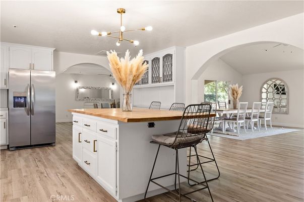 Dining room, Interior, Kitchen, Pendant Lights, Stainless Steel Appliances, Wood Texture Flooring