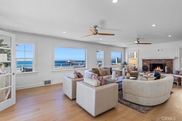 Fireplace, Interior, Living room, Recessed Lighting, Water, Wood Texture Flooring