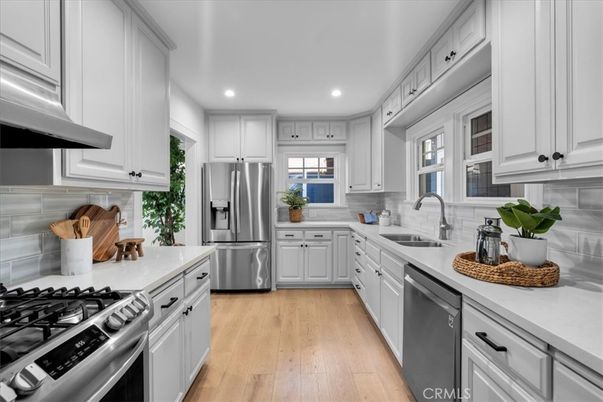 Interior, Kitchen, Recessed Lighting, Stainless Steel Appliances, Wood Texture Flooring