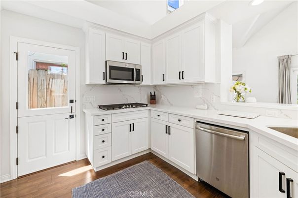 Interior, Kitchen, Marble Walls, Stainless Steel Appliances, Wood Texture Flooring