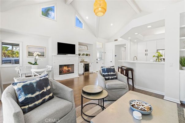 Dining room, Fireplace, Interior, Living room, Pendant Lights, Recessed Lighting, Wood Texture Flooring