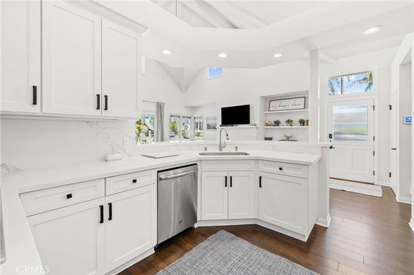 Interior, Kitchen, Marble Walls, Recessed Lighting, Stainless Steel Appliances, Wood Texture Flooring
