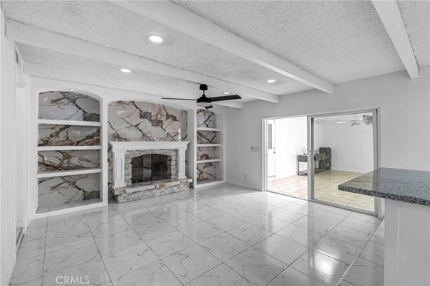 Empty room, Fireplace, Interior, Marble, Recessed Lighting, Stone Walls