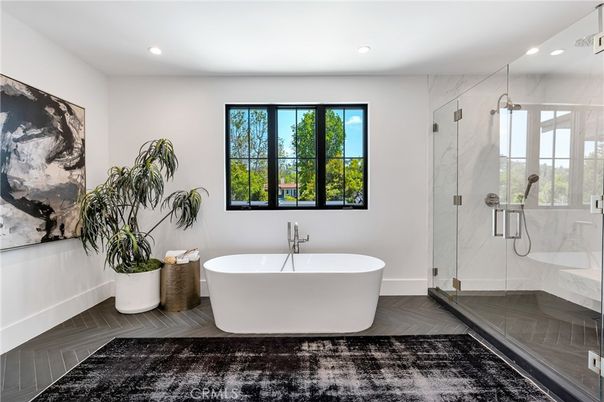 Bathroom, Free Standing Baths, Glass Shower, Interior, Marble Walls, Recessed Lighting, Wood Texture Flooring