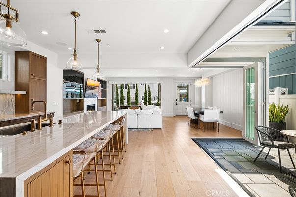 Chandelier, Dining room, Interior, Kitchen, Living room, Pendant Lights, Recessed Lighting, Wood Texture Flooring