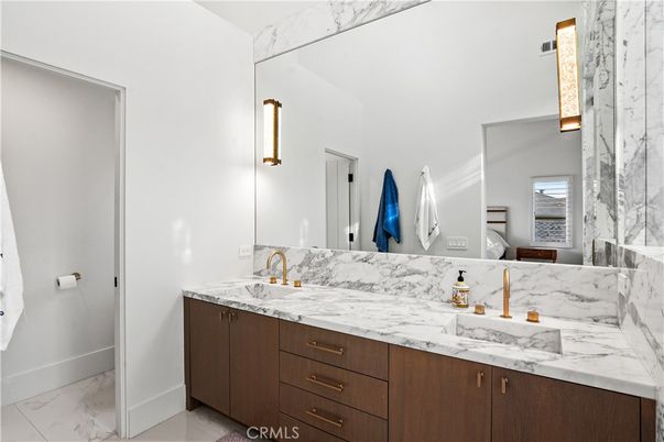 Bathroom, Dual Sink Vanities, Glass Shower, Interior, Marble, Marble Walls