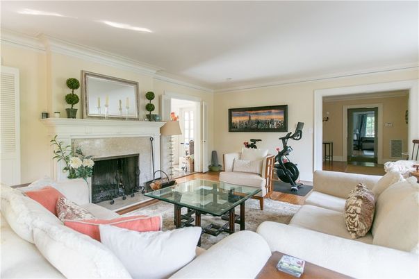 Fireplace, Fitness Equipment, Interior, Living room, Recessed Lighting, Wood Texture Flooring