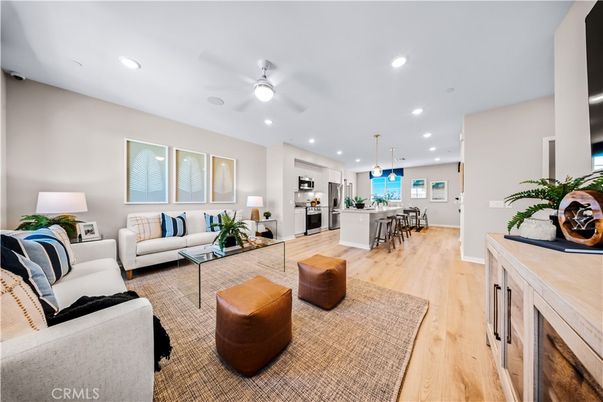Dining room, Interior, Kitchen, Living room, Pendant Lights, Recessed Lighting, Stainless Steel Appliances, Wood Texture Flooring