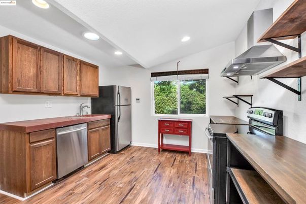 Interior, Kitchen, Recessed Lighting, Stainless Steel Appliances, Wood Texture Flooring