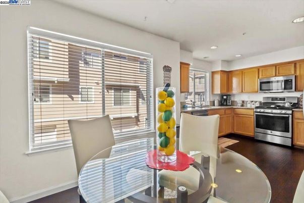 Dining room, Interior, Kitchen, Recessed Lighting, Stainless Steel Appliances, Wood Texture Flooring