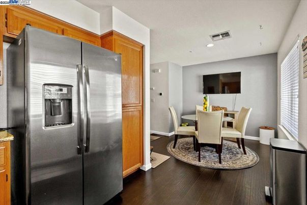 Dining room, Interior, Kitchen, Recessed Lighting, Stainless Steel Appliances, Wood Texture Flooring