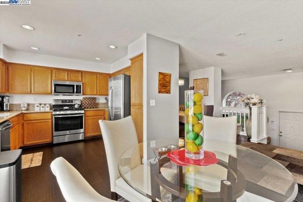 Dining room, Interior, Kitchen, Recessed Lighting, Stainless Steel Appliances, Wood Texture Flooring