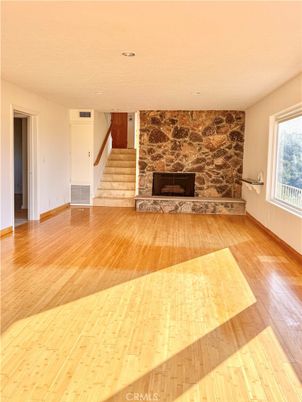 Empty room, Fireplace, Interior, Recessed Lighting, Wood Texture Flooring
