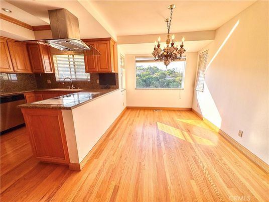 Chandelier, Interior, Kitchen, Recessed Lighting, Tile Countertops, Wood Texture Flooring