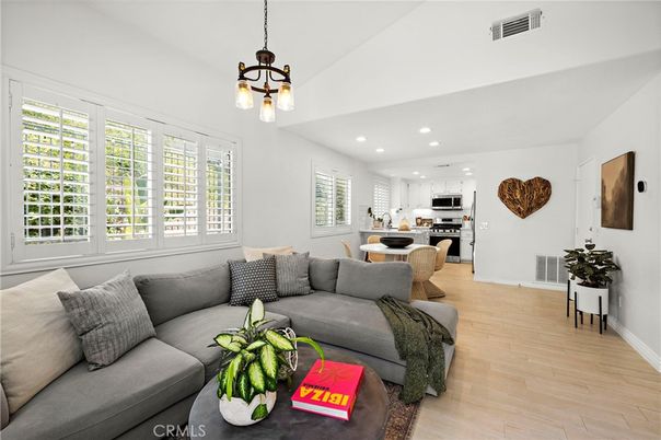 Dining room, Interior, Kitchen, Living room, Pendant Lights, Recessed Lighting, Stainless Steel Appliances, Wood Texture Flooring