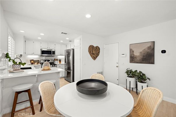 Dining room, Interior, Kitchen, Recessed Lighting, Stainless Steel Appliances, Wood Texture Flooring
