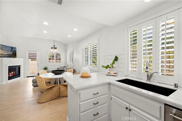 Dining room, Fireplace, Interior, Kitchen, Pendant Lights, Recessed Lighting, Wood Texture Flooring