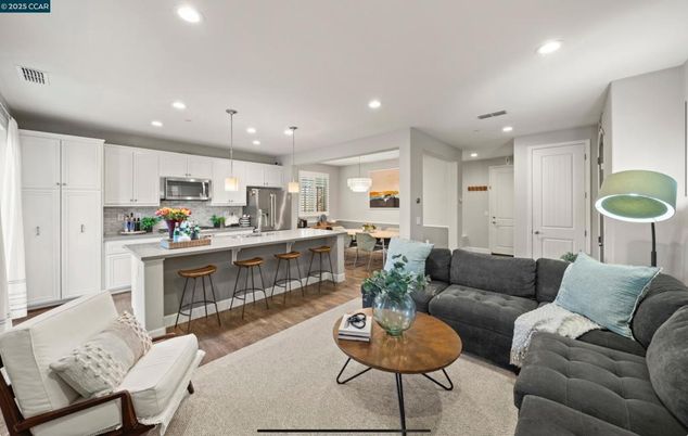 Dining room, Interior, Kitchen, Living room, Pendant Lights, Recessed Lighting, Stainless Steel Appliances, Wood Texture Flooring