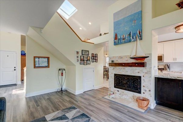 Fireplace, Interior, Pendant Lights, Recessed Lighting, Wood Texture Flooring