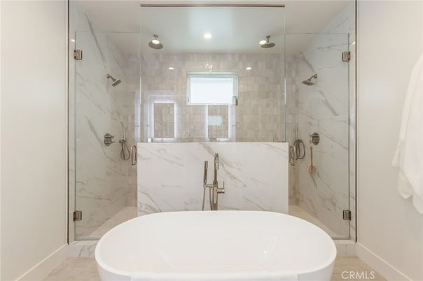 Bathroom, Free Standing Baths, Glass Shower, Interior, Marble Walls, Recessed Lighting