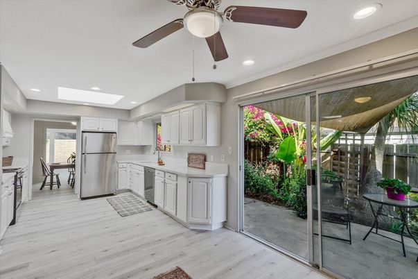 Dining room, Interior, Kitchen, Recessed Lighting, Stainless Steel Appliances, Wood Texture Flooring