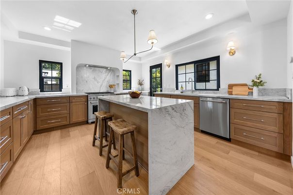 Interior, Kitchen, Marble Walls, Pendant Lights, Recessed Lighting, Stainless Steel Appliances, Wood Texture Flooring