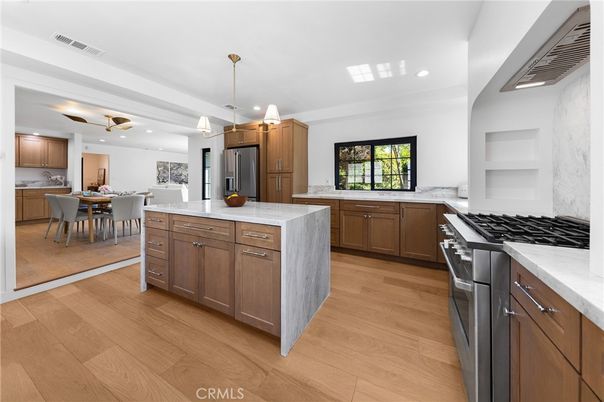 Dining room, Interior, Kitchen, Pendant Lights, Recessed Lighting, Stainless Steel Appliances, Wood Texture Flooring