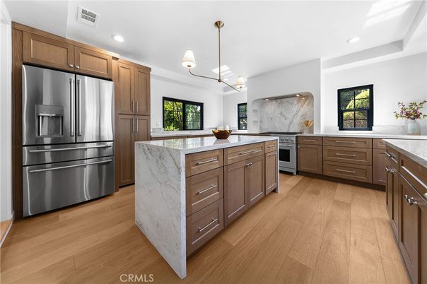 Interior, Kitchen, Marble Walls, Pendant Lights, Recessed Lighting, Stainless Steel Appliances, Wood Texture Flooring