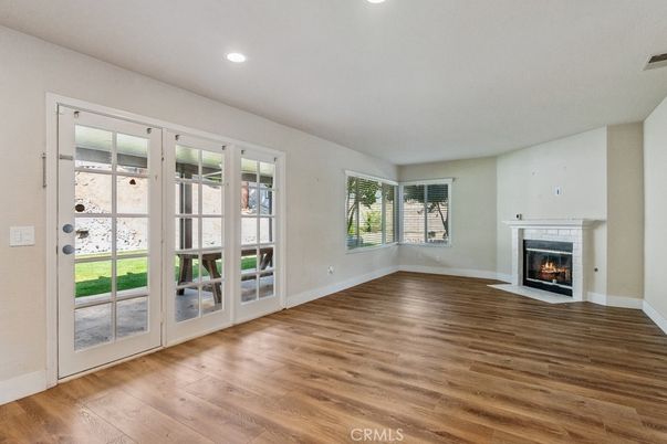 Empty room, Fireplace, Interior, Recessed Lighting, Wood Texture Flooring