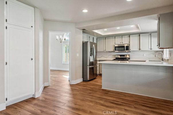 Interior, Kitchen, Recessed Lighting, Stainless Steel Appliances, Wood Texture Flooring