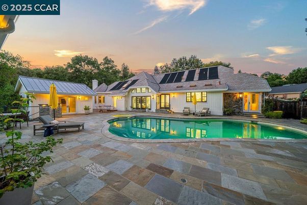 Exterior, Pool, Solar Panels