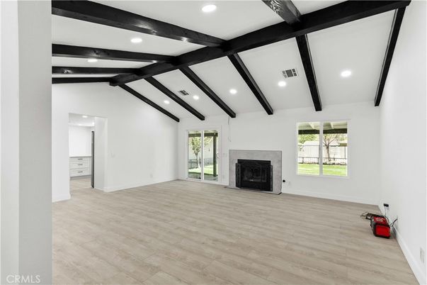 Empty room, Fireplace, Interior, Recessed Lighting, Wooden Beams, Wood Texture Flooring