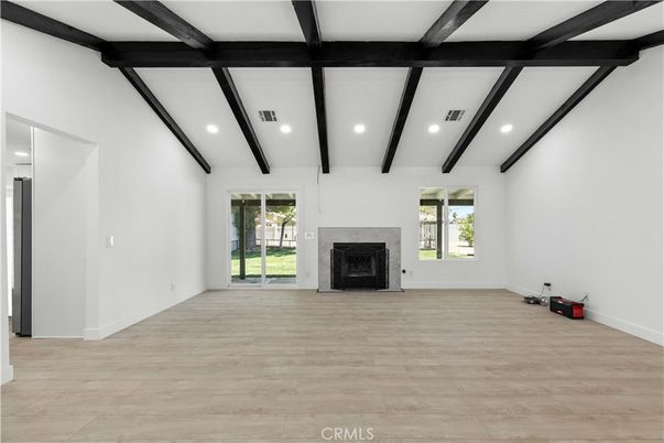 Empty room, Fireplace, Interior, Recessed Lighting, Wooden Beams, Wood Texture Flooring