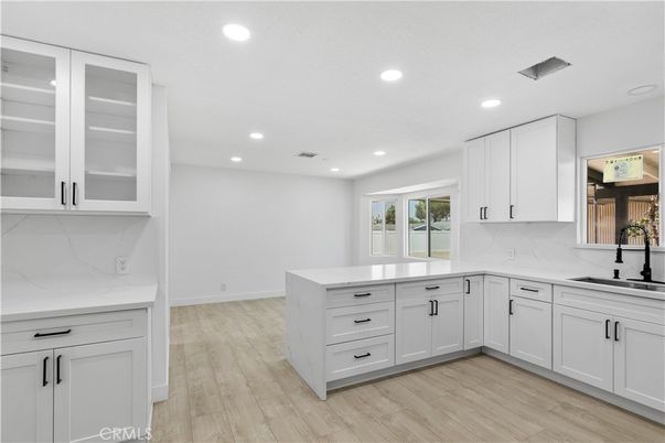 Interior, Kitchen, Marble Walls, Recessed Lighting, Wood Texture Flooring