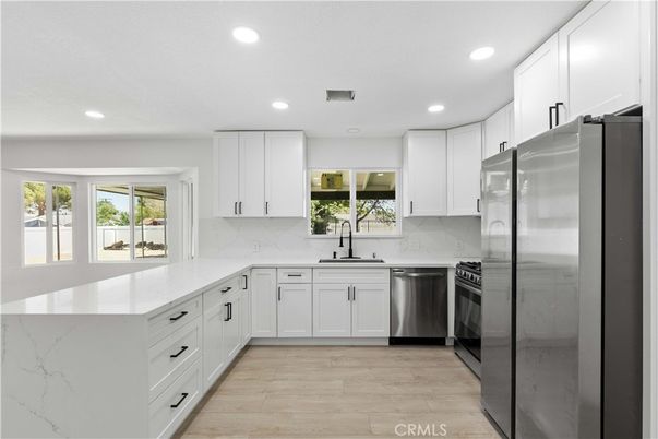 Interior, Kitchen, Recessed Lighting, Stainless Steel Appliances, Wood Texture Flooring