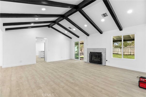Empty room, Fireplace, Interior, Recessed Lighting, Wooden Beams, Wood Texture Flooring
