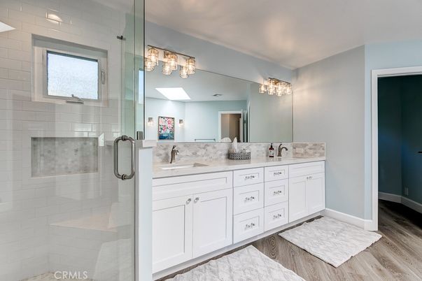 Bathroom, Dual Sink Vanities, Glass Shower, Interior, Wood Texture Flooring