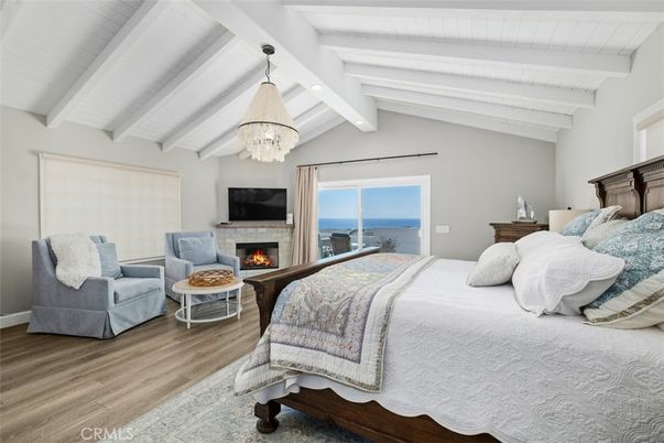 Bedroom, Chandelier, Fireplace, Interior, Living room, Water, Wood Texture Flooring