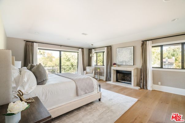 Bedroom, Fireplace, Interior, Pendant Lights, Recessed Lighting, Wood Texture Flooring