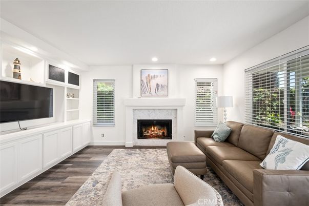 Fireplace, Interior, Living room, Recessed Lighting, Wood Texture Flooring