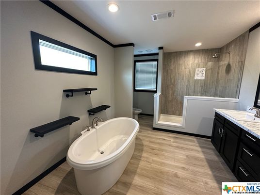 Bathroom, Free Standing Baths, Interior, Recessed Lighting, Wood Texture Flooring
