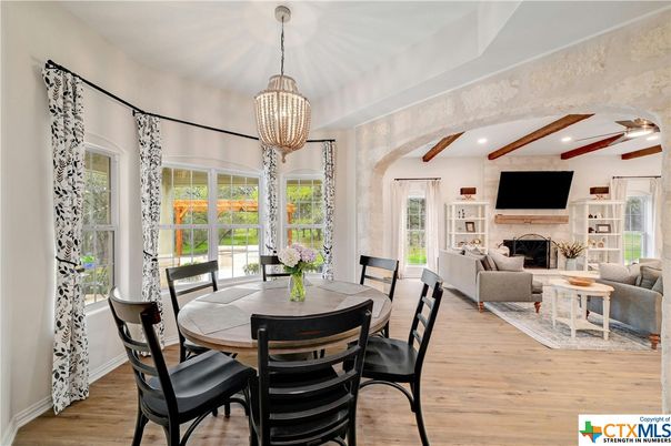 Dining room, Fireplace, Interior, Living room, Pendant Lights, Recessed Lighting, Wooden Beams, Wood Texture Flooring
