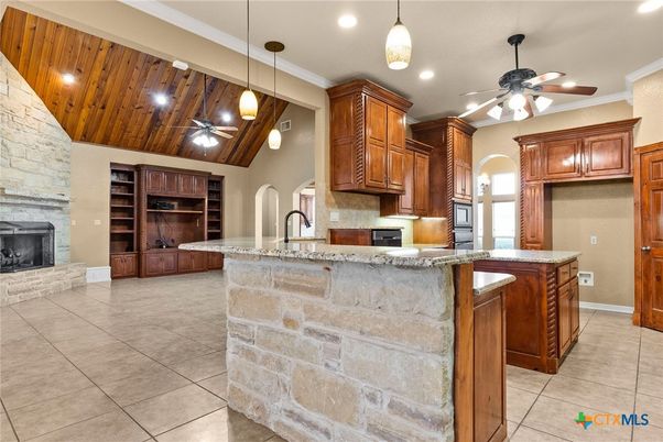 Fireplace, Interior, Kitchen, Pendant Lights, Recessed Lighting, Stone Walls, Wooden Ceilings