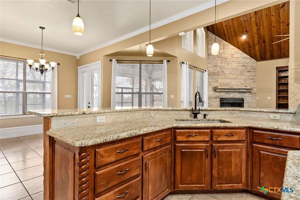 Fireplace, Interior, Kitchen, Pendant Lights, Stone Walls