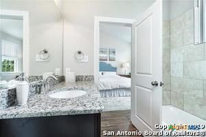 Bathroom, Bedroom, Dual Sink Vanities, Glass Shower, Interior, Wood Texture Flooring