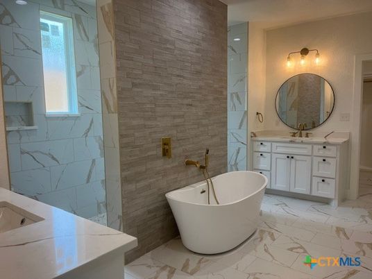 Bathroom, Dual Sink Vanities, Free Standing Baths, Interior, Marble, Marble Walls