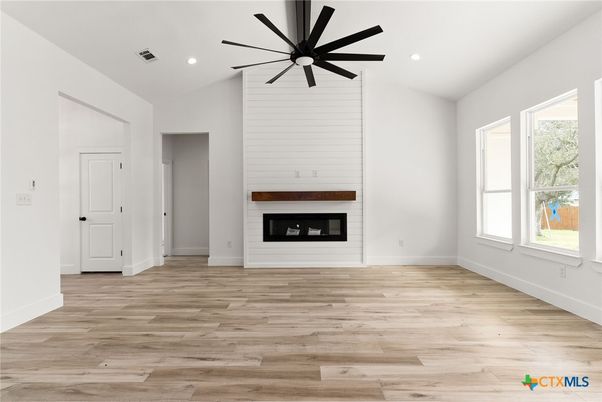 Empty room, Fireplace, Interior, Recessed Lighting, Wood Texture Flooring