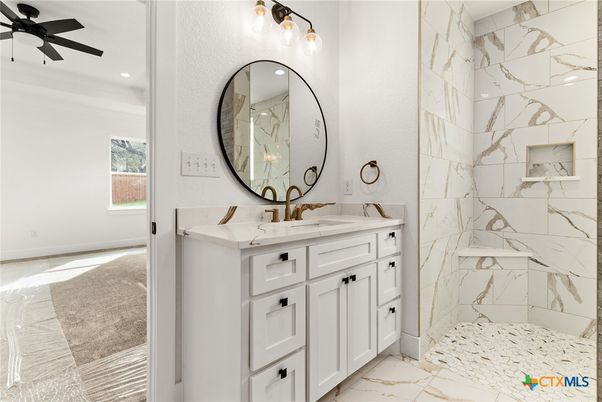 Bathroom, Dual Sink Vanities, Interior, Marble, Marble Walls, Recessed Lighting