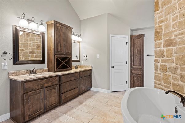 Bathroom, Dual Sink Vanities, Free Standing Baths, Interior, Stone Walls